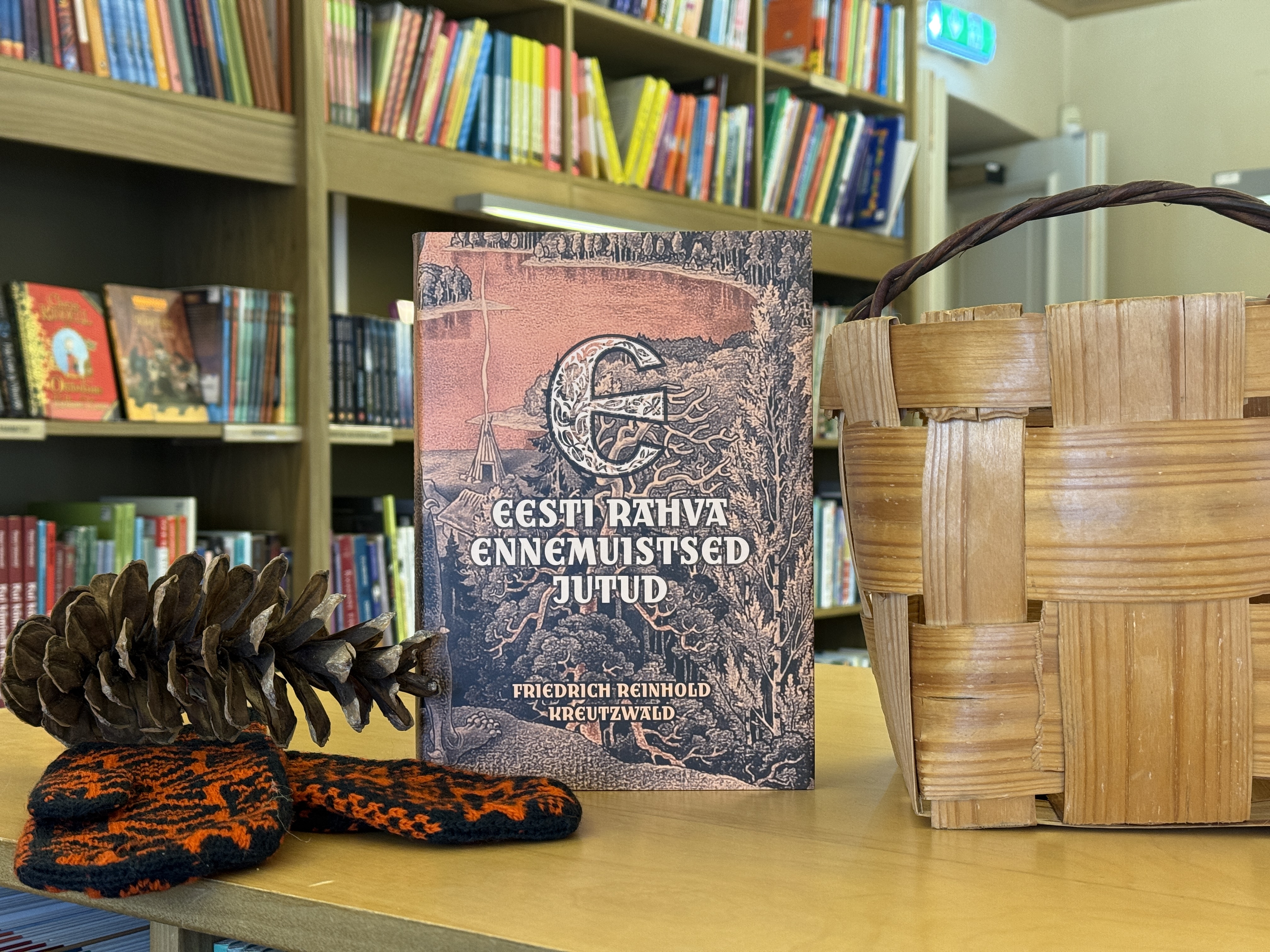 Raamat, Eesti rahva ennemuistsed jutud, laastukorvi ja käbiga